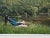 Young Boy Fishing by a Beautiful Riverside in Lush Green English Countryside, by 20th Century British Artist Art measures...