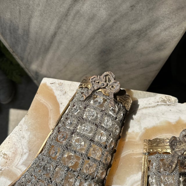 Up for consideration is a beautiful vintage pair of gold metal and crystal basket style small wall sconces. These would...