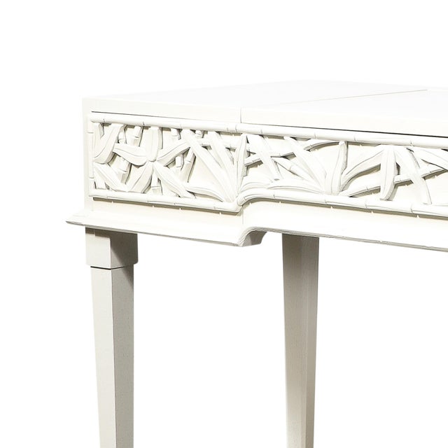 This Mid-Century Modernist fold-top vanity/writing desk, designed by legendary American furniture maker James Mont,...