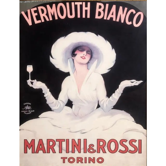 This striking poster design by celebrated Italian illustrator Marcello Dudovich exemplifies the elegance and...