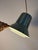A timeless milestone: The Auditorie 1 pendant lamp – designed by Svend Middelboe for Nordisk Solar – embodies the purist...