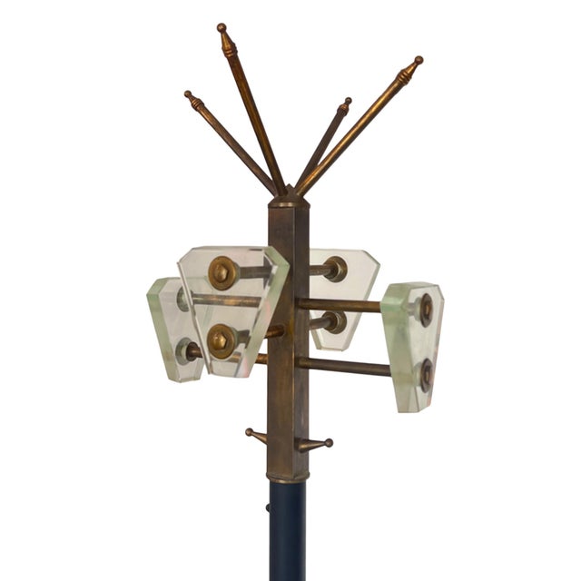 Decorative and practical, this coat and hat stand was made in Italy in the 1950s, in the style of Max Inbrand. It has a...