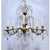 This is a Spanish style bronze chandelier with ornate designed frame and dressed with Swedish style hand cut crystal. It...