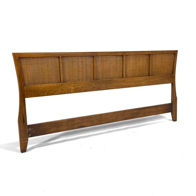 This beautiful king size headboard has a lovely flared profile and five inset cane panels offering the perfect degree of...