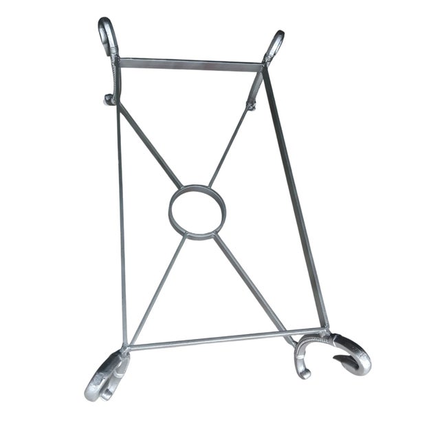 This exquisite piece captures the essence of Hollywood Regency design with its striking details and luxurious materials....