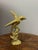 This vintage English brass songbird on a branch is a charming study in detail and craftsmanship. The casting captures the...
