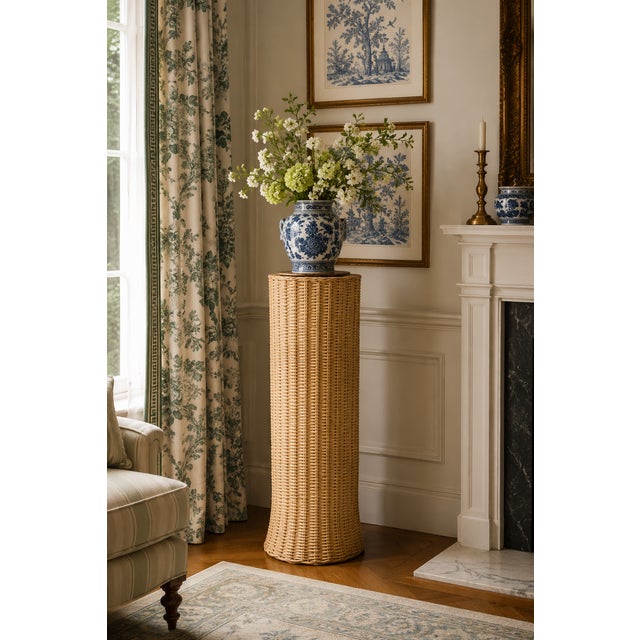 Showcase your favorite decor with our Large Round Wicker Pedestal. Crafted from high-quality natural wicker, this pedestal...