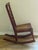 A classic hand crafted rocking chair with ornate three tiered back. No arms. Smooth in great condition. Seat is in very...