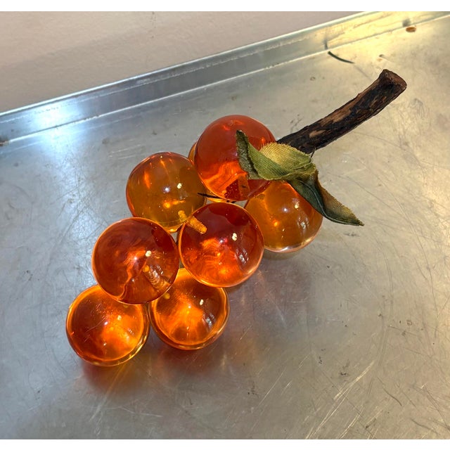 1970s large orange lucite grape bunch. Excellent condition.