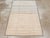 This mid-20th-century Turkish Anatolian throw rug presents a quietly modern striped composition in soft ivory, warm beige,...