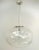 Italian pendant with a large clear Murano pebble glass shade mounted on brass frame in polished chrome finish / designed...