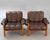 Dimensions: H 29.1” x W 34.6” x D 33” x SH 15.7” Pair of Vintage Scandinavian Ekornes “Montana” teak armchairs with brown...
