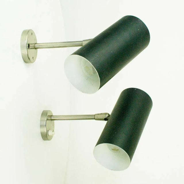 This minimalistic and pure Austrian Mid-Century zylindrical pair of wall lights with was designed and manufactured by J....