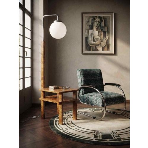 An exceptional and highly collectible art deco multi-functional floor lamp with an integrated two-tier side table,...