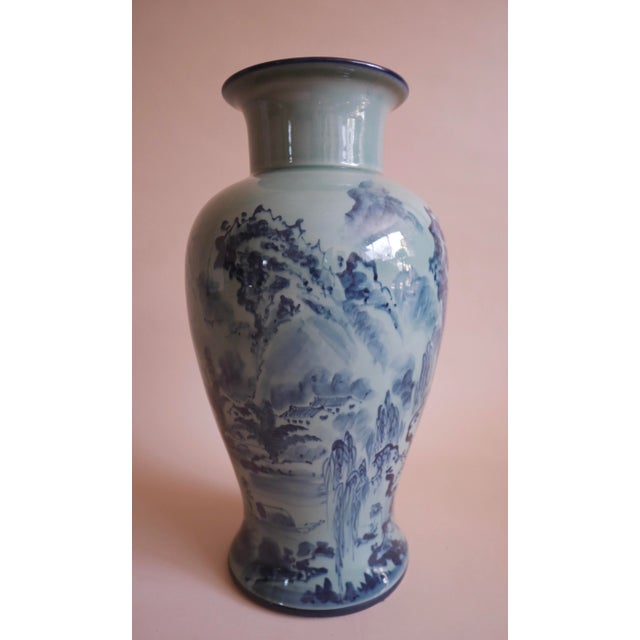 XL vintage Chinese ceramic vase. Beautiful blue painted landscape imagery with Chinese characters on opposite side. Tall,...