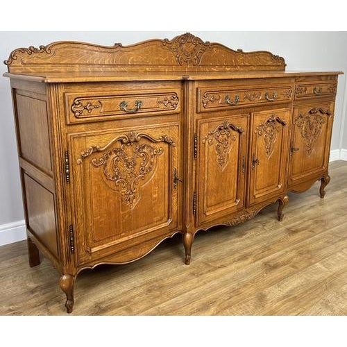 A magnificent Vintage French Louis style sideboard , beautifully crafted with elegant proportions and richly carved...