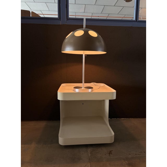 Nice large table lamp made by Raak Amsterdam, consisting of a brushed chrome base and a plastic shade covered by another...