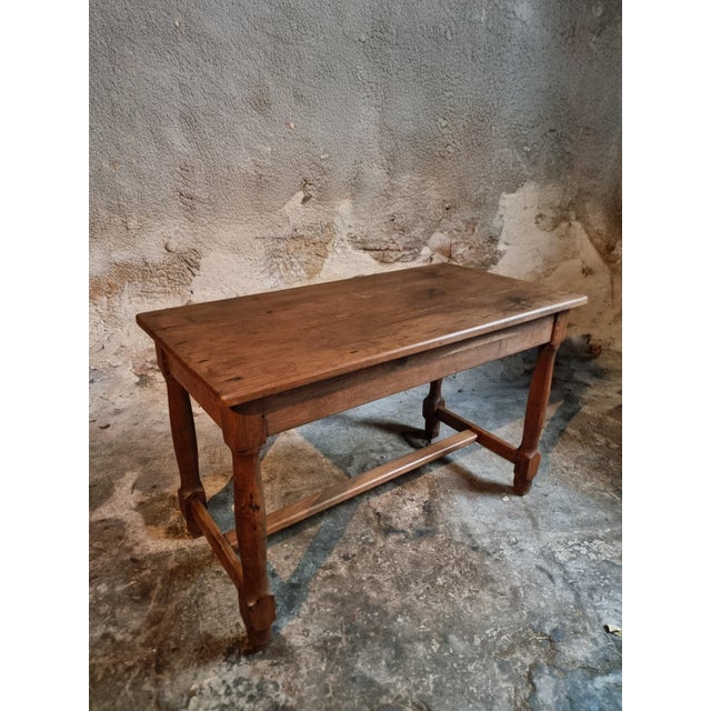 A rare and authentic Late 18th Century French Oak Farmhouse Table, dating from approximately 1780–1830. This beautiful...