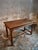 A rare and authentic Late 18th Century French Oak Farmhouse Table, dating from approximately 1780–1830. This beautiful...