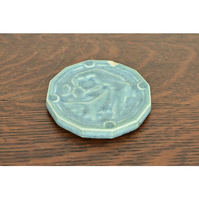 A gorgeous antique Arts & Crafts period glazed ceramic art pottery "Potter at the Wheel" paper weight By Rookwood Pottery...