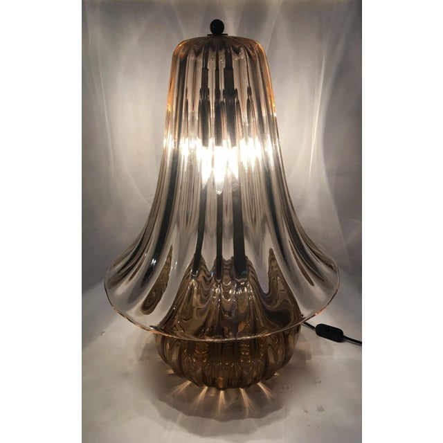 Table lamp in good condition, glass. They are 2 glasses, one above the other, joined by the iron frame. The glass of this...