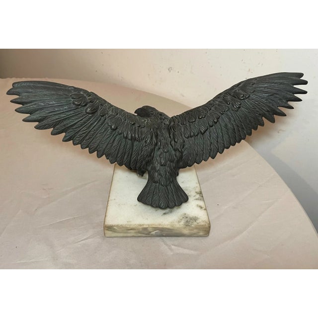 This antique solid bronze open winged American bald eagle statue is a stunning addition to any collection. Crafted with...