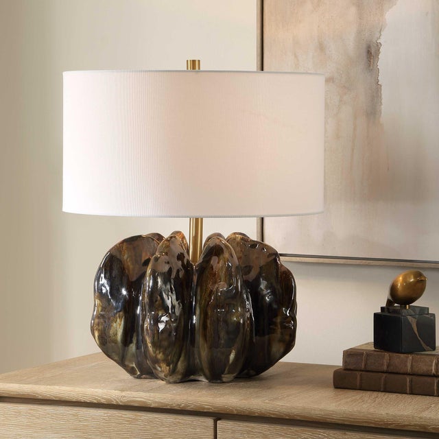 This Captivating Ceramic Table Lamp Features A Unique Organic Base With Deep Ridges, Finished In Rich, Dark Shades Of...