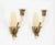 Magnificent pair of wall lamps in a gorgeous ivory murano artglass and brass. These charming sconces were designed by...