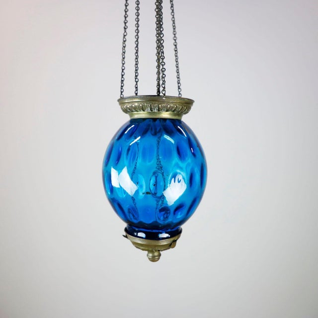 Circa 1920. We offer this beautiful Antique Hanging Candle Lantern. The Lantern includes a beautiful system where the...