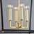 Natick is clean, open, and airy. The double roofline stands out from a traditional lantern, while the Aged Brass metal...