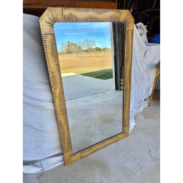 Found in the South of France, this Early 20th Century Art Deco Style Wall Mirror was crafted in France in the 1920's. The...