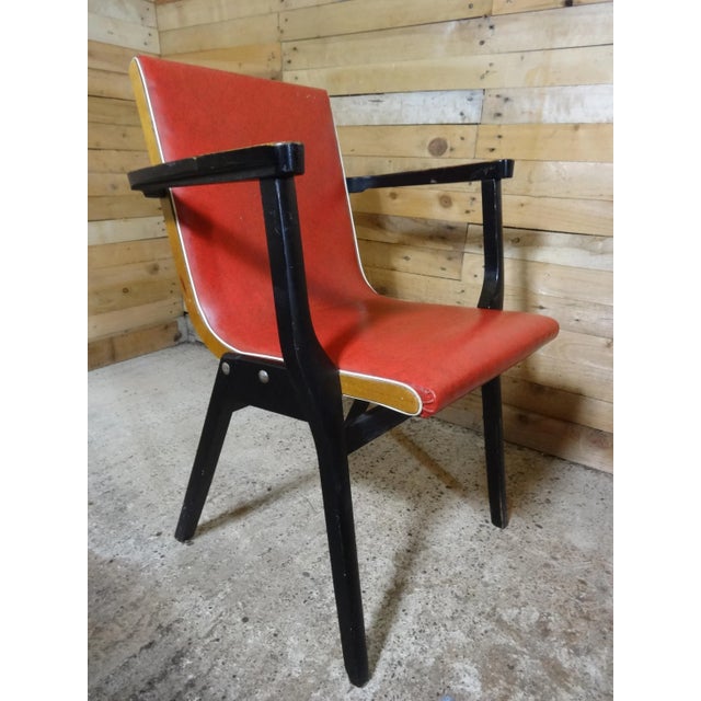 - Early 1950s ebonized Stako dining chairs - Set of chairs (4) stackable - Upholstered in the original vinyl which is in...