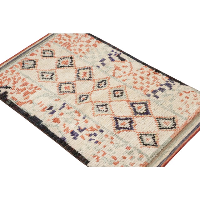 Hand-knotted in wool and silk, this 2x3 Moroccan rug features geometric patterns inspired by primitivist Berber weaving...