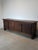 Impressive vintage brutalist sideboard crafted from solid wood, defined by its substantial proportions, raw construction...