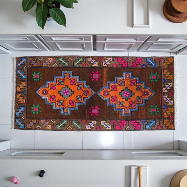 Vintage Turkish Hand-Knotted Small Rug from Konya, 1960s. Authentic mini accent rug featuring warm brown and orange tones...