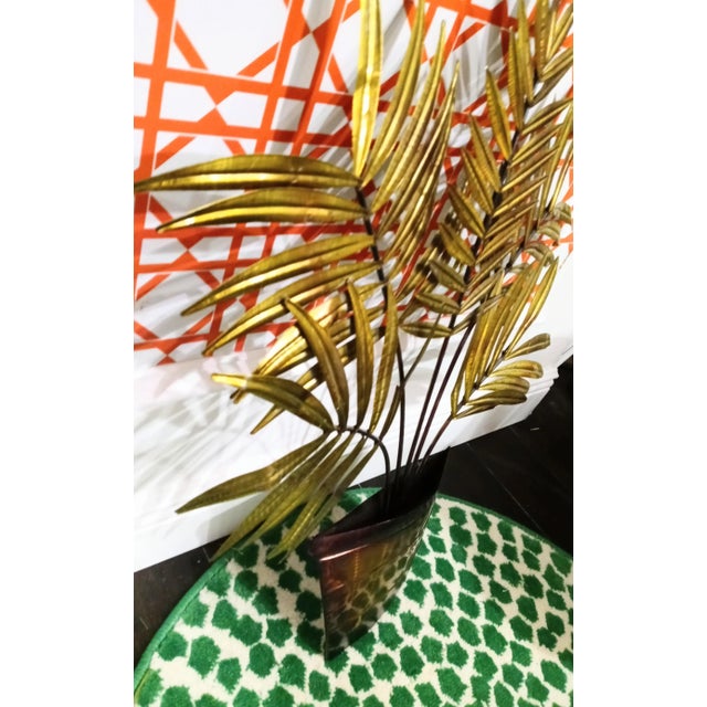 Vintage metal potted plant wall art in the style of Curtis Jere. This is such a sweet little wall accent with such awesome...