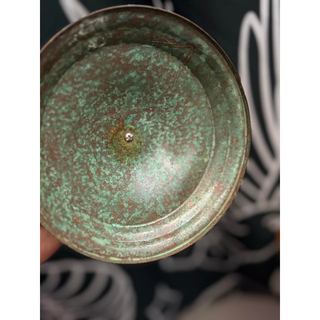 An exceptional Art Deco bronze covered dish by renowned designer Carl Sorensen, dating to the 1930s. This striking piece...
