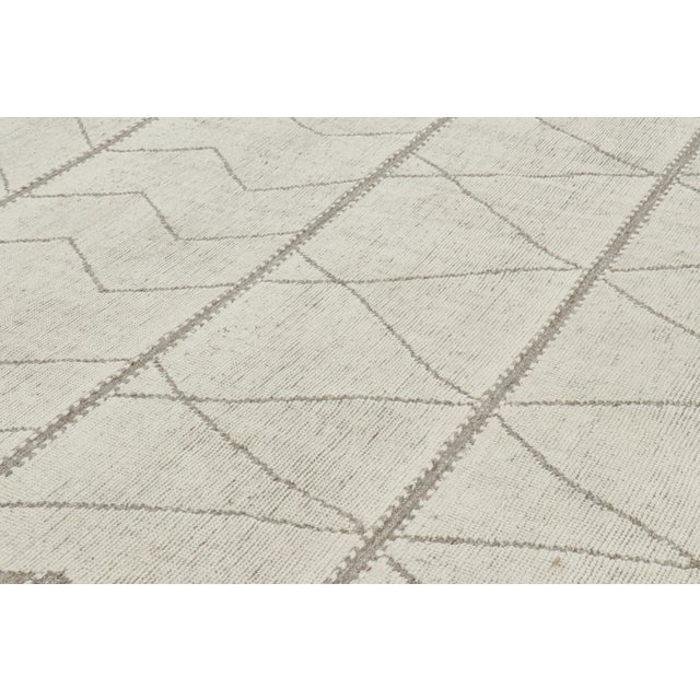 This handwoven wool 8x10 contemporary rug is an exciting addition to the Moroccan rug collection by Rug & Kilim. Its...