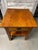 Mid-Century Modern sturdy solid wood table with a single drawer.