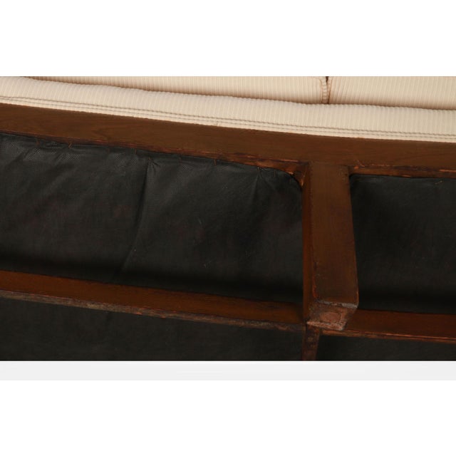Mid-century modern stunning, beautiful, high-quality long, curved, walnut framed sofa in the style of Johannes Andersen...