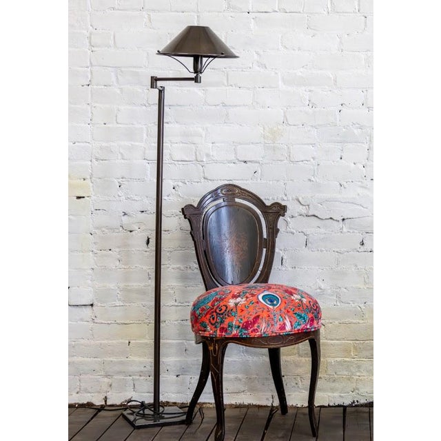 This floor lamp is frrom the French retailer, "Pour La Galerie". It has an adjustable arm with a foot switch and metal...