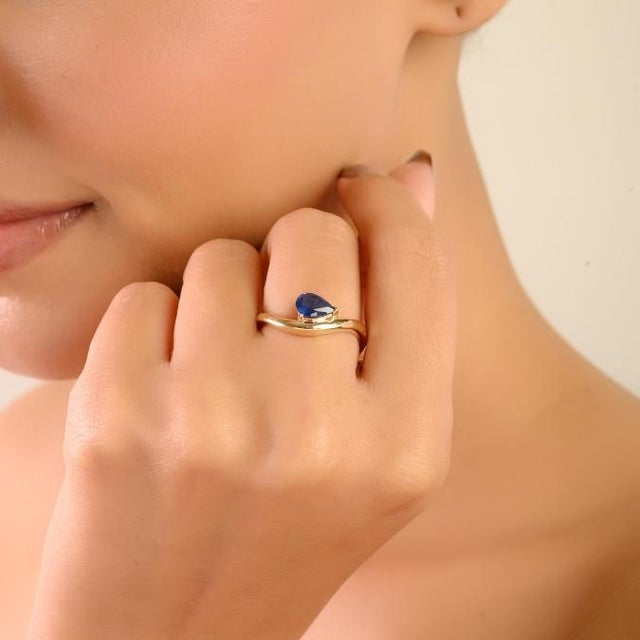 Modern Pear Cut Prong Set Deep Blue Sapphire Wave Ring in 14k Yellow Gold Size 5 For Sale In New York - Image 6 of 13