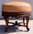 Round Ottoman with Carved Legs and Leather Upholstered Seat For Sale In Denver - Image 6 of 7