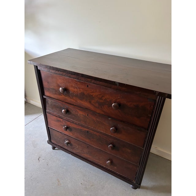 This is a gorgeous piece of history! Beautiful substantial piece with stunning wood tone and original feet. Solid sturdy...