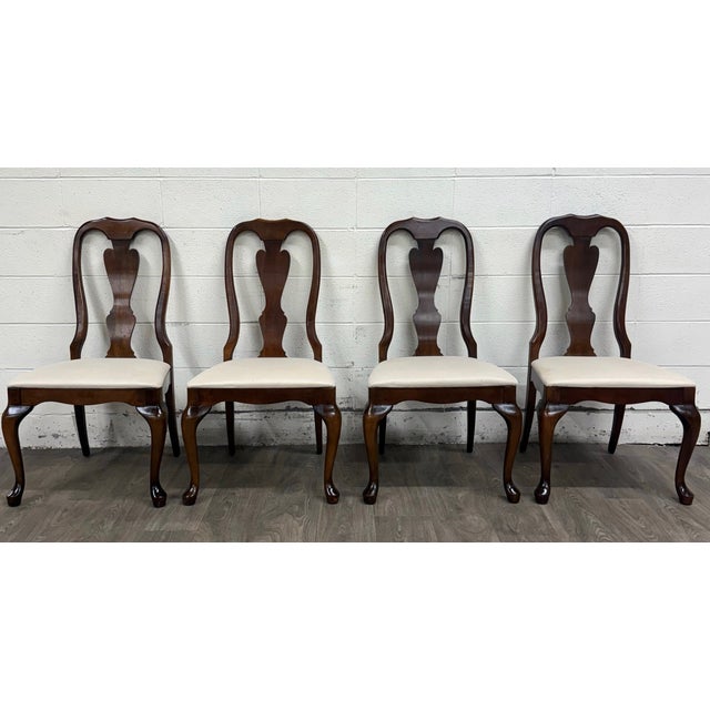 This is a gorgeous set of four Crawford Furniture Manufacturing “Heirloom” Queen Anne dining side chairs crafted in solid...