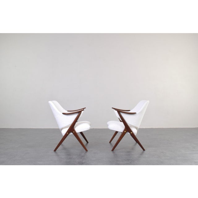 This set of two armchairs model Knott was produced in the 1960s in Norway by Brunstad Møbelfabrikk. The wooden elements...