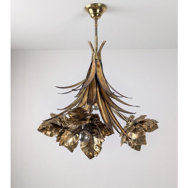 This ceiling fixture was designed by the Parisian house Maison Jansen during the 1970s, representing the French Mid-...