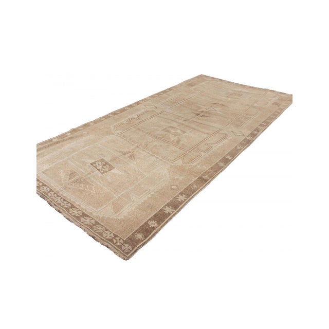 Vintage handknotted decorative wool rug from Kars region of Turkey. Approximately 50-60 years old. In very good condition.