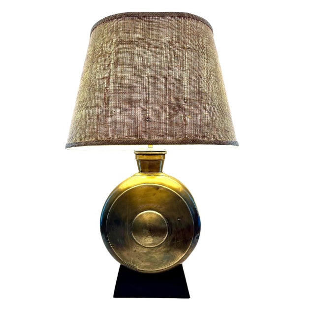 This one-of-a-kind mid-size rustic style table lamp is made from an antique hand-crafted brass urn with a drum-like shape,...