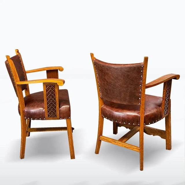 Period: 1st half of the 20th century, material: solid oak, genuine leather. The design-untypical chairs come from the...